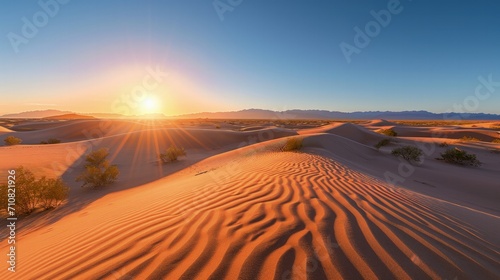 Sunrise over sand dunes in Death Valley National Park  California