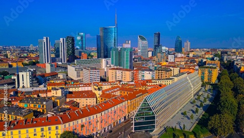 Aerial view of modern architecture from the mirrored windows of Microsoft Italia and Fondazione Giangiacomo Feltrinelli. Porta Volta in Garibaldi District. City streets. Sunny day. Italy Milan 01.2024