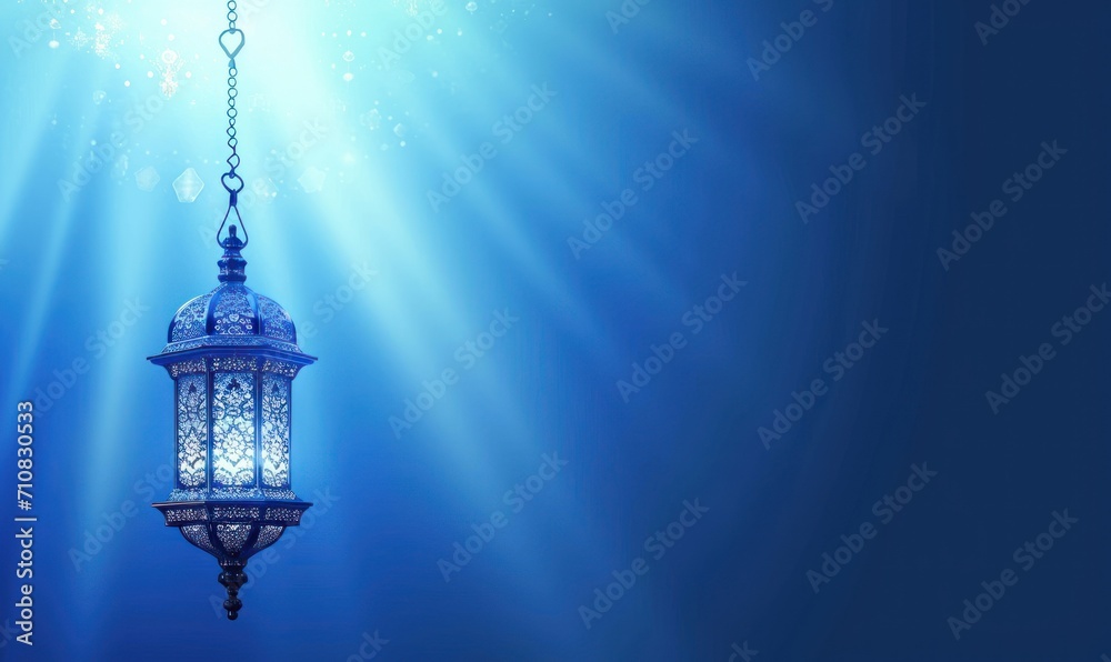 A Lantern Amidst Simple Islamic Artistry Ramadhan Month, Bathed in Ethereal Light with Blue Background A Lantern Amidst Simple Islamic Artistry Ramadhan Month, Bathed in Ethereal Light with Blue Background