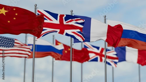 Permanent members of the United Nations Security Council flags waving together on cloudy sky, endless seamless loop