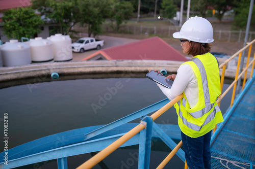Environmental engineers work at wastewater treatment plants,Water supply engineering working at Water recycling plant for reuse,Check the amount of chlorine in the water to be within the criteria. © reewungjunerr
