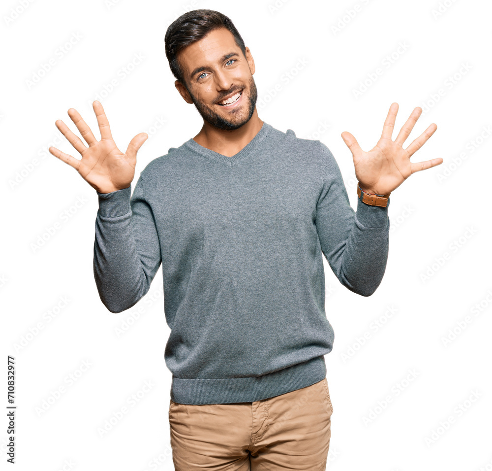 Handsome hispanic man wearing casual clothes showing and pointing up with fingers number ten while smiling confident and happy. Handsome hispanic man wearing casual clothes showing and pointing up with fingers number ten while smiling confident and happy.