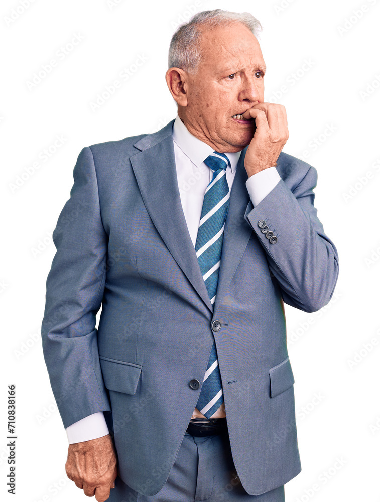 Senior handsome grey-haired man wearing elegant suit looking stressed and nervous with hands on mouth biting nails. anxiety problem. Senior handsome grey-haired man wearing elegant suit looking stressed and nervous with hands on mouth biting nails. anxiety problem.