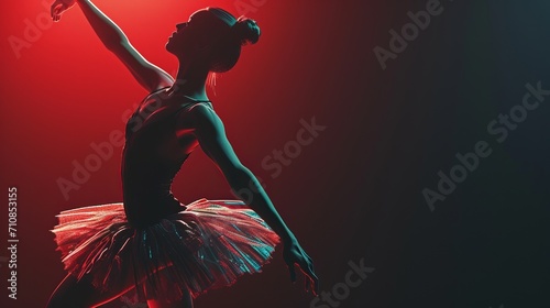 Silhouette of a ballerina with black and red background photo