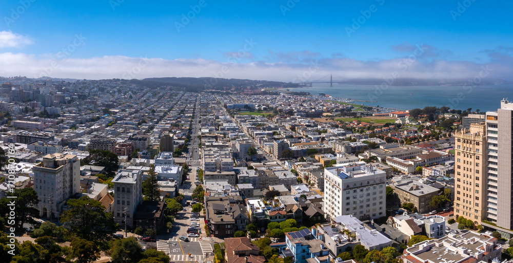 Panoramic view of aerial Lombard Street, an east west street in San Francisco, California. Famous for steep, one block section with eight hairpin turns. Crookedest, steep hills, sharp curves