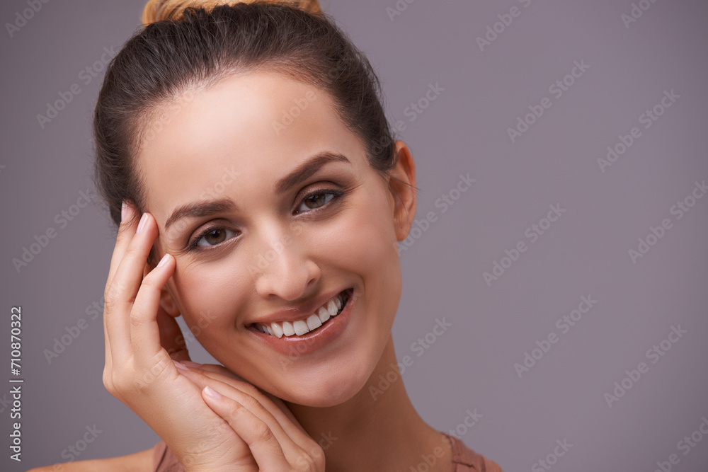 Portrait, smile and beauty with woman on space in studio for skincare, wellness or natural cosmetics. Face, aesthetic and mockup with happy young person on gray background for natural dermatology Portrait, smile and beauty with woman on space in studio for skincare, wellness or natural cosmetics. Face, aesthetic and mockup with happy young person on gray background for natural dermatology