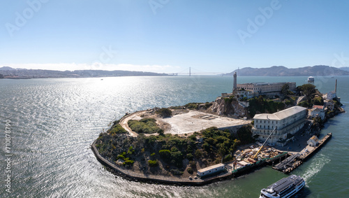 Aerial view of the prison island of Alcatraz in San Francisco Bay, Alcatraz jail in San Francisco bay aerial view. Beautiful aerial view of the Alcatraz island with Golden Gate bridge.