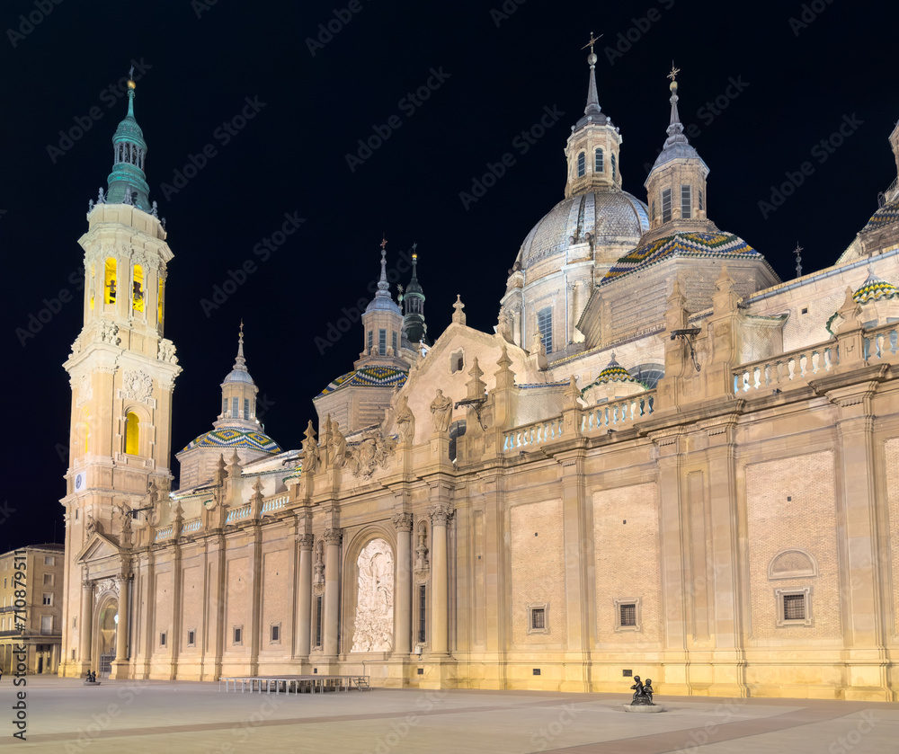 Basilica of Our Lady of the Pillar illuminated at night, Zaragoza, Spain. High quality photo