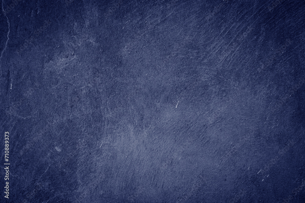 Rustic blue wall background with darker black grungy border
