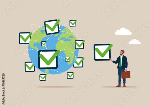 Leadership skill. Businessman put new completed checkbox on world map across globe. Flat vector illustration