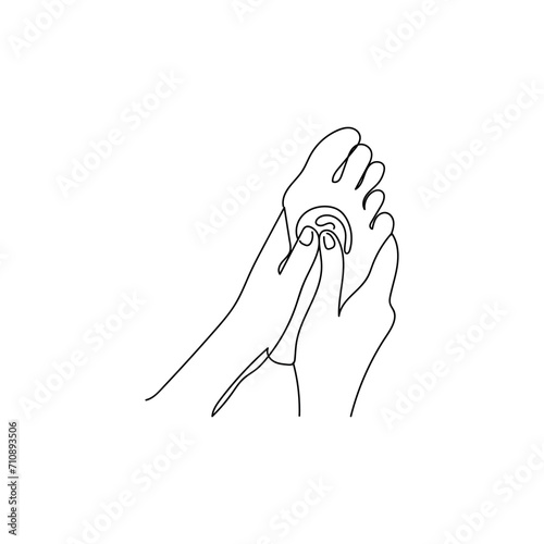 Hands massaging foot on white background
