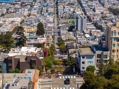 Panoramic view of aerial Lombard Street, an east west street in San Francisco, California. Famous for steep, one block section with eight hairpin turns. Crookedest, steep hills, sharp curves