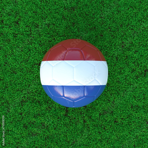 Flag Of Netherlands On Soccer Ball With Grass Background