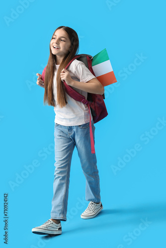 Little girl with backpack a...