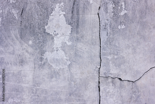 Concrete wall with a crack. Concrete texture.