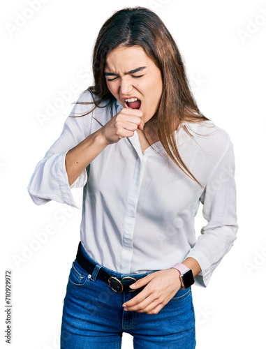 Young caucasian girl wearing casual white shirt feeling unwell and coughing as symptom for cold or bronchitis. health care concept.