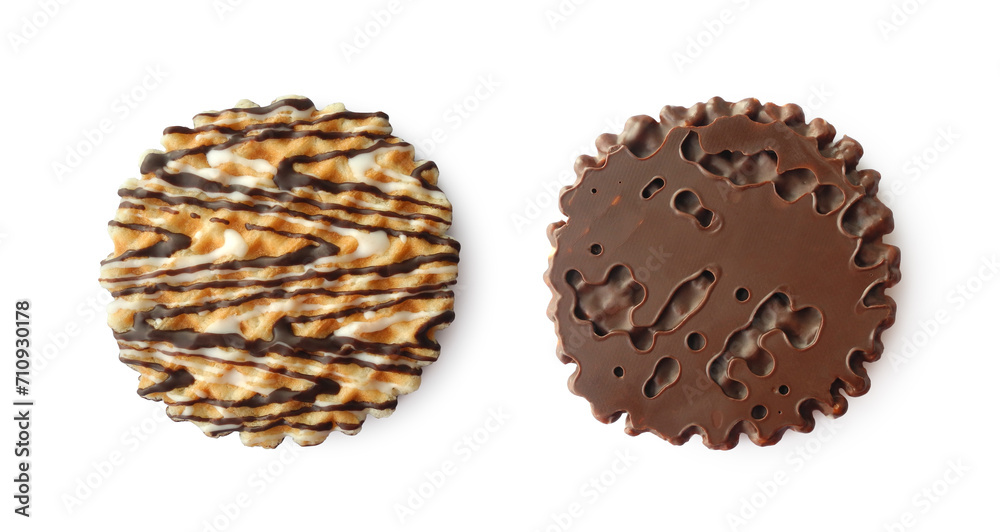 Crispy round wafers with milk chocolate icing front and back side isolated on white background top view
Crispy round wafers with milk chocolate icing front and back side isolated on white background top view