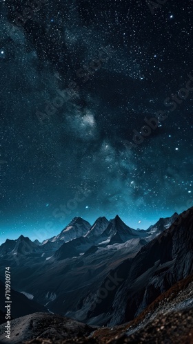 Starry night sky, mountains silhouette against the vastness of space © DreamPointArt
