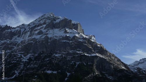 View of Swiss mountain peak with snow and sky