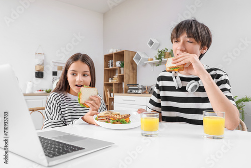 Cute children with laptop, ...