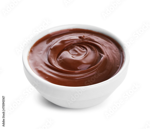 Bowl of delicious melted chocolate on white background