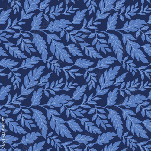 Seamless pattern with leaves in blue shades. Vector botanical background