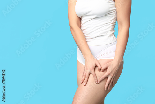 Wallpaper Mural Body positive woman in underwear on blue background, closeup Torontodigital.ca