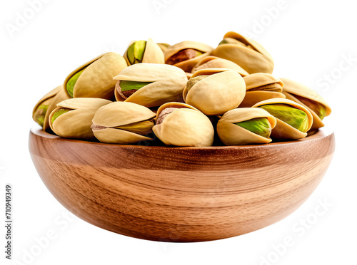 pistachio nuts in a wooden bowl isolated on a transparent background