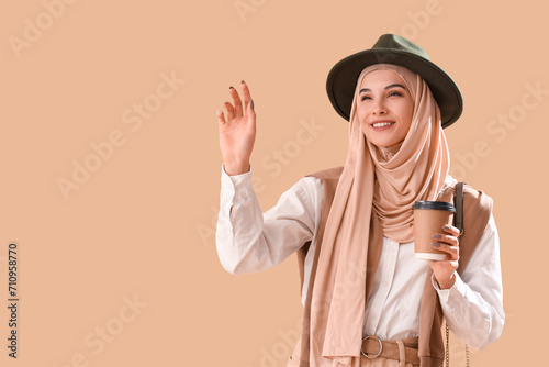 Stylish Muslim woman with c...