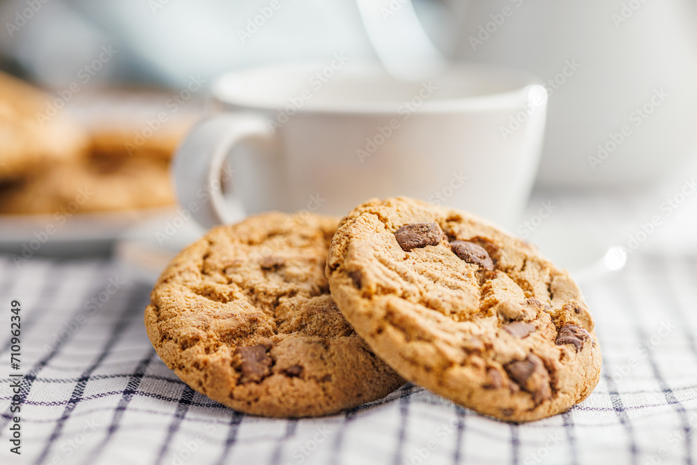 Sweet chocolate cookies on checkered napkin. Sweet chocolate cookies on checkered napkin.