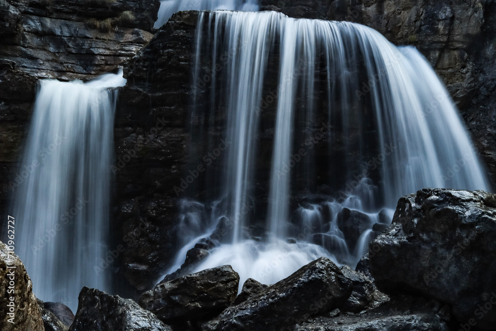 Obraz premium Powerful waterfall in dark colors