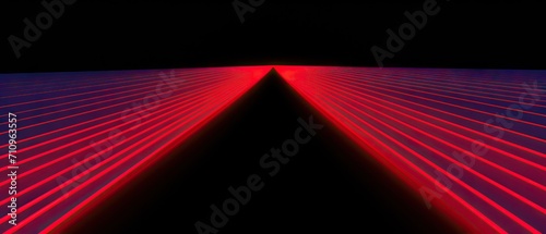 A wide-angle view of vibrant red light rays converging in the darkness photo