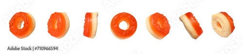 Set of donut shaped jelly gummies isolated on white background. Different angles to create a levitation effect. photo