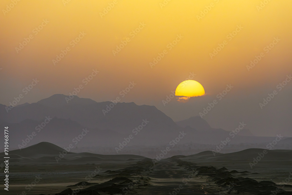 Iran. Sunset at Khara Desert (part of Varzaneh Desert)