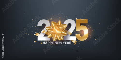 Happy new year 2025. Golden self adhesive gift bow with white paper numbers and confetti, against dark background. Holiday greeting card. 