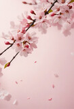 Pink cherry blossom wallpaper with flower-shaped cutouts on a soft background.