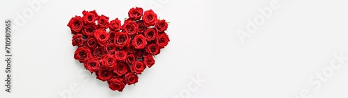  heart shaped red roses flower arrangement on white background.  horizontal wallpaper with large copy space for text. valentine  s day and wedding card or banner  love concept