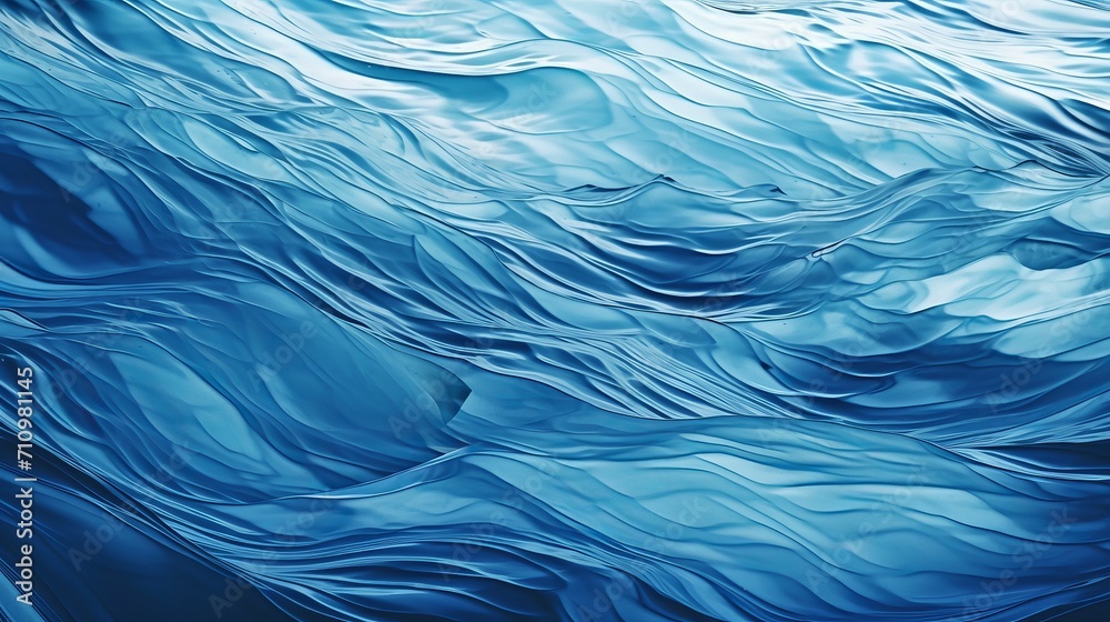 The background of a blue wallpaper design features a texture of water ripples. The background of a blue wallpaper design features a texture of water ripples.