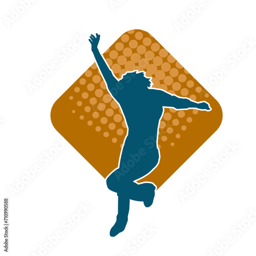Silhouette of a female dancer in action pose. Silhouette of a woman dancing happily.