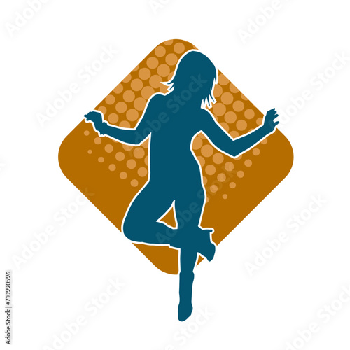 Silhouette of a female dancer in action pose. Silhouette of a woman dancing happily.
