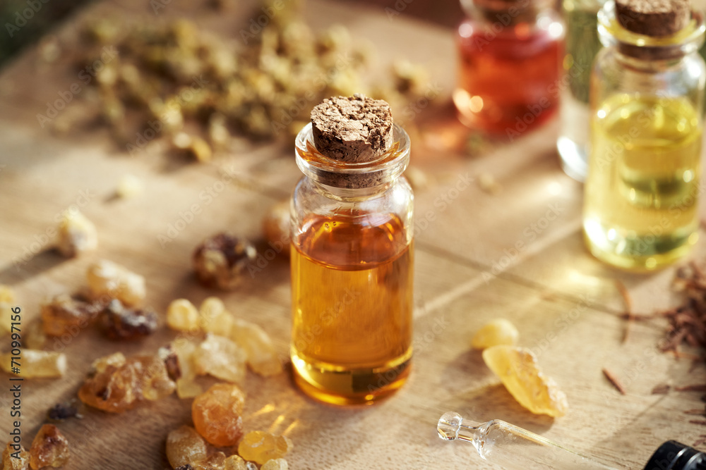 A bottle of frankincense essential oil with boswellia resin
