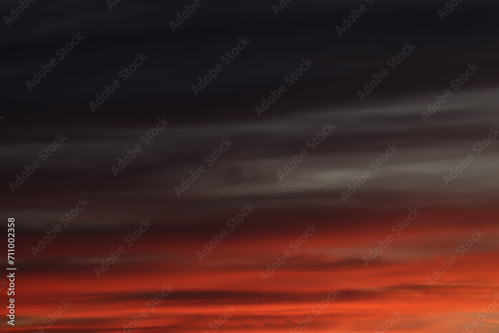 A breathtaking sunset sky painted with a palette of deep reds and oranges, a dramatic backdrop that evokes a sense of calm and wonder. A breathtaking sunset sky painted with a palette of deep reds and oranges, a dramatic backdrop that evokes a sense of calm and wonder.