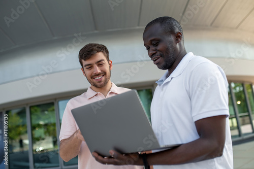 Two partners having a meeting and looking excited