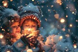 Two children holding a lit candle in the snow. Can be used to depict winter traditions and celebrations