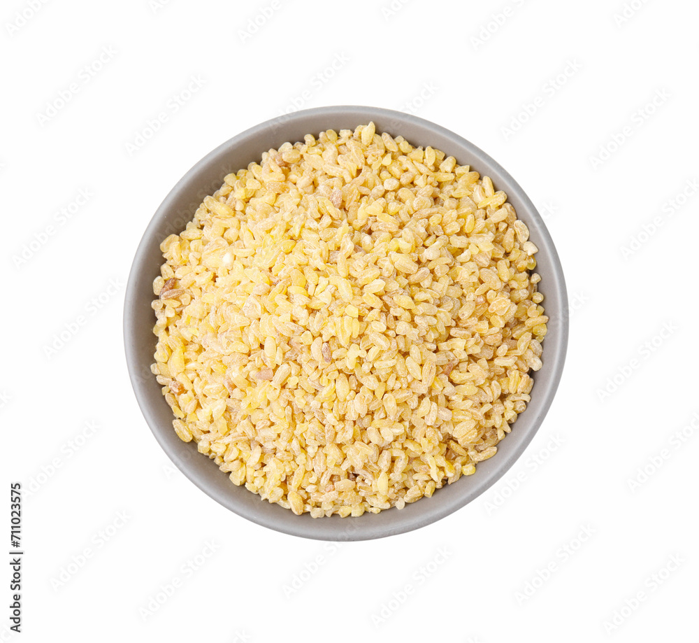 Raw bulgur in bowl isolated on white, top view Raw bulgur in bowl isolated on white, top view