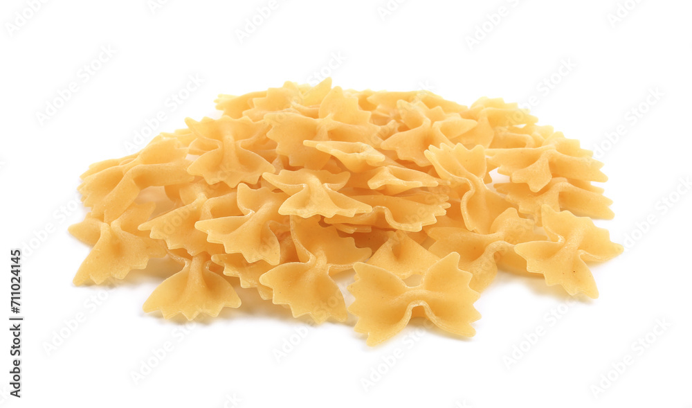 Pile of raw farfalle pasta isolated on white Pile of raw farfalle pasta isolated on white