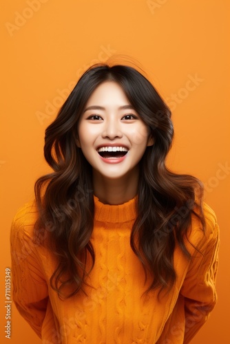 Portrait of a young Asian woman smiling