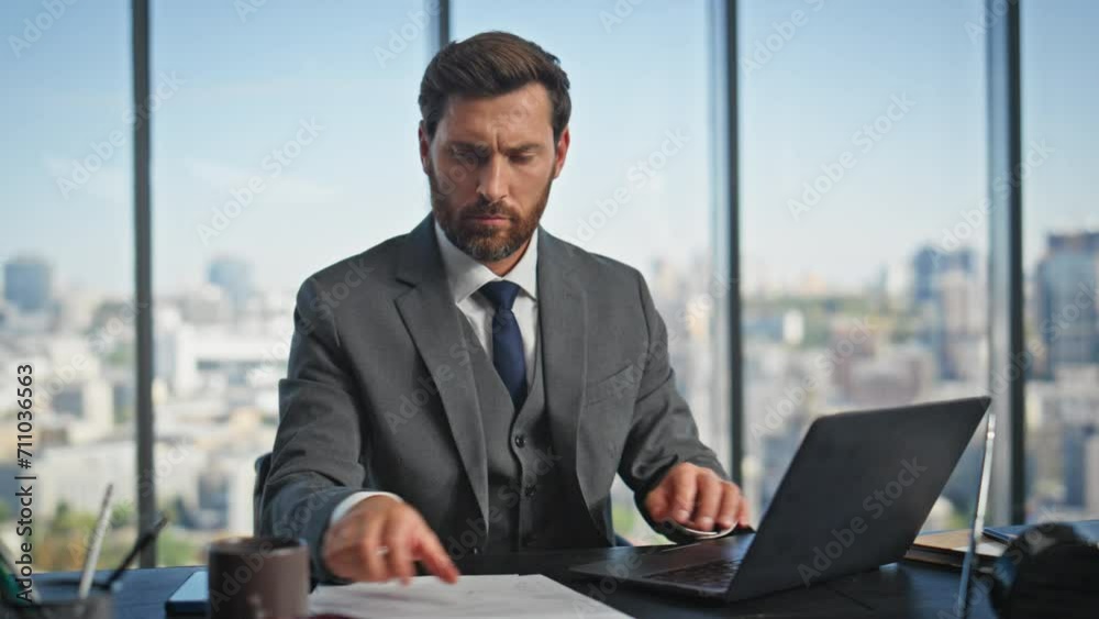 Focused director working computer analysing report data. Office manager typing Focused director working computer analysing report data. Office manager typing