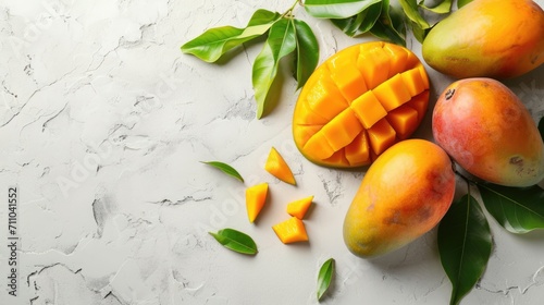 Fresh juicy mango with leaves and water drops. Healthy exotic fruits background with free place for text