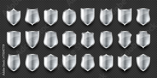 Set of various vintage 3d metal shield icons. Shiny steel heraldic shields. Black protection and security symbol, label. Vector illustration